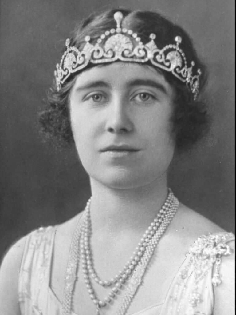 Black and White photo of the Queen Elizabeth II mother. Wearing the Lotus Flower British royal tiara. 